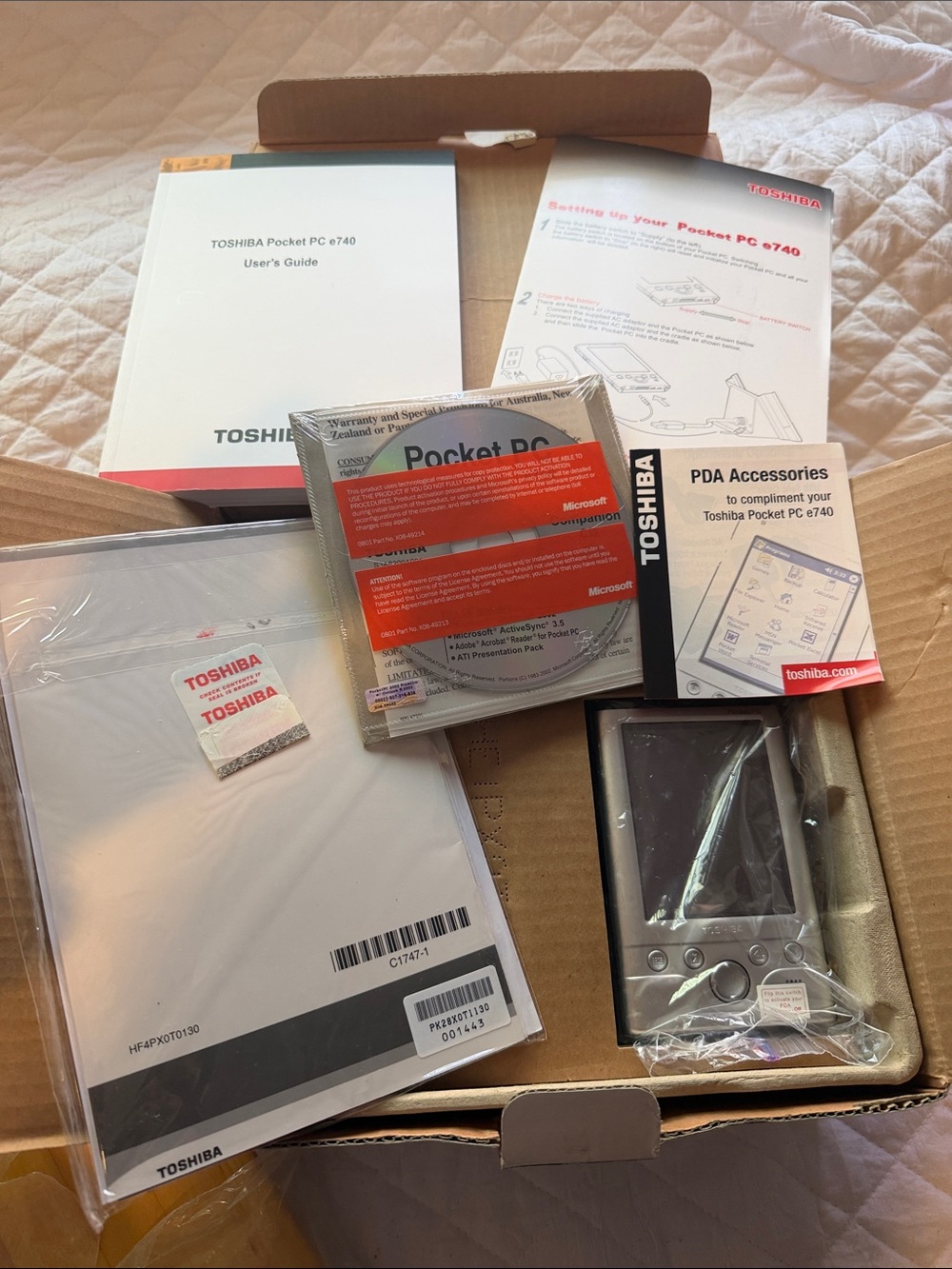 Toshiba Pocket PC set with manuals, CD and PDA accessories - Silver and Black